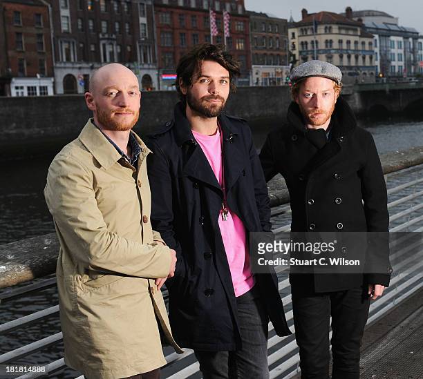 James Johnston, Simon Neil and Ben Johnston of Biffy Clyro pose ahead of tomorrow's fifth annual Arthur's Day celebrations on September 25, 2013 in...