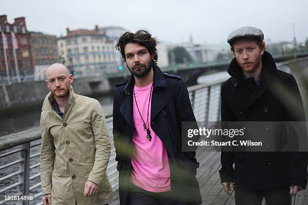 James Johnston, Simon Neil and Ben Johnston of Biffy Clyro pose ahead of tomorrow's fifth annual Arthur's Day celebrations on September 25, 2013 in...