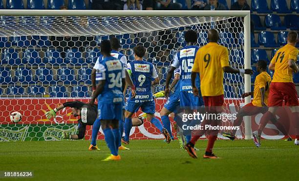 Laszlo Koteles of Krc Genk - Herve Onana of AFC Tubize in action during the Cofidis Cup match between KRC Genk and AFC Tubize on September 25, 2013...