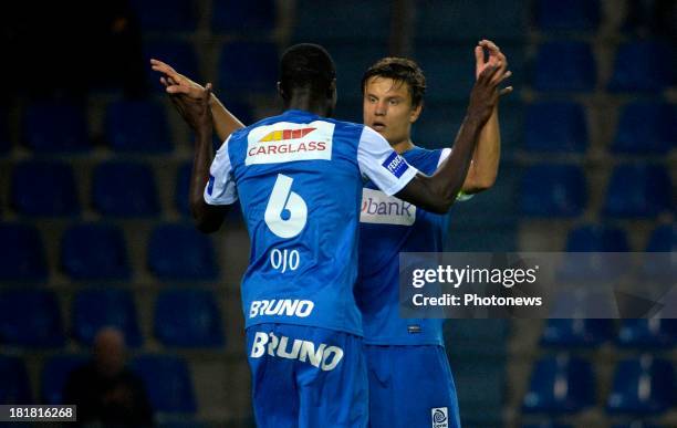 Kim Ojo of Krc Genk - Jelle Vossen of Krc Genk in action during the Cofidis Cup match between KRC Genk and AFC Tubize on September 25, 2013 in Genk,...