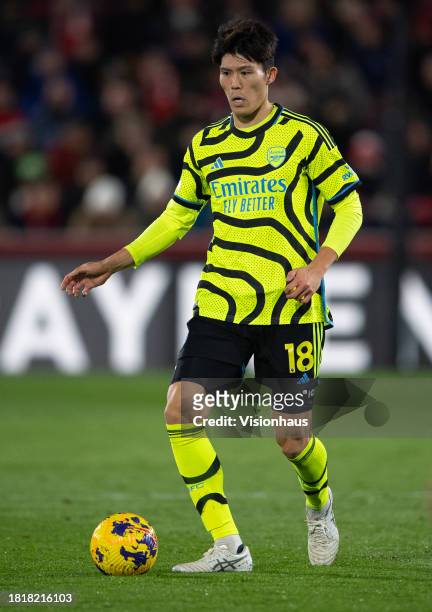 Takehiro Tomiyasu of Arsenal during the Premier League match between Brentford FC and Arsenal FC at Gtech Community Stadium on November 25, 2023 in...