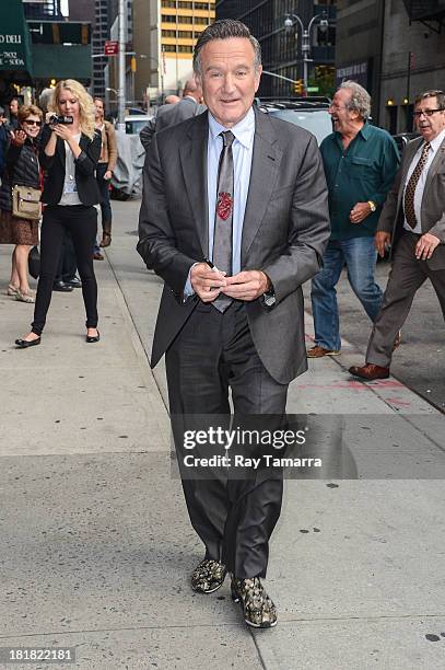 Actor Robin Williams enters the "Late Show With David Letterman" taping at the Ed Sullivan Theater on September 25, 2013 in New York City.