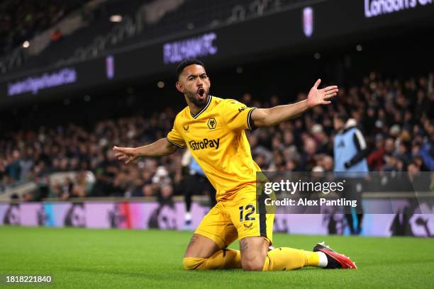 Matheus Cunha of Wolves celebrates scoring his side first goal during the Premier League match between Fulham FC and Wolverhampton Wanderers at...