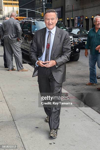 Actor Robin Williams enters the "Late Show With David Letterman" taping at the Ed Sullivan Theater on September 25, 2013 in New York City.