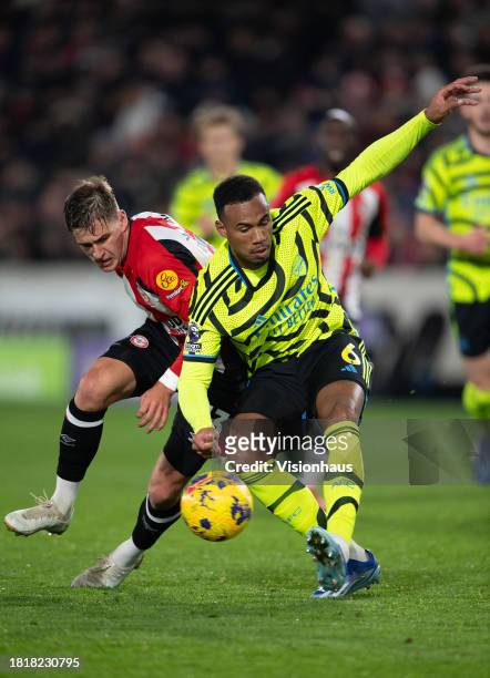 Yegor Yarmolyuk of Brentford and Magalhaes Gabriel of Arsenal during the Premier League match between Brentford FC and Arsenal FC at Gtech Community...