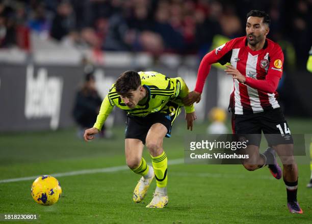 Saman Ghoddos of Brentford and Kai Havertz of Arsenal during the Premier League match between Brentford FC and Arsenal FC at Gtech Community Stadium...