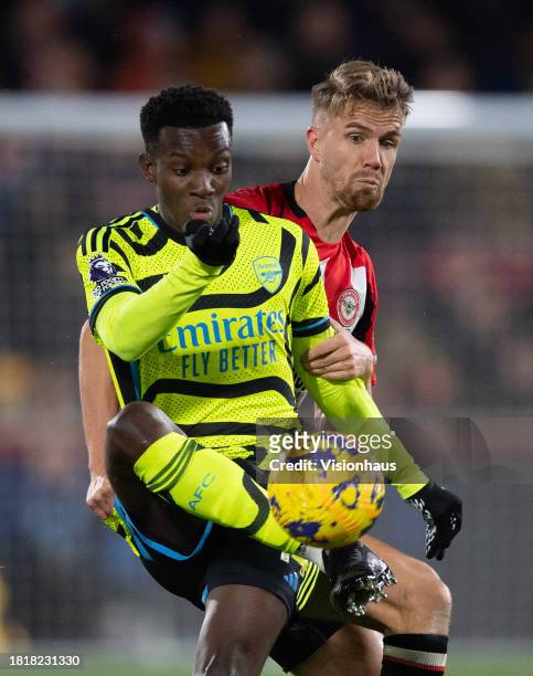 Kristoffer Ajer of Brentford and Eddie Nketiah of Arsenal during the Premier League match between Brentford FC and Arsenal FC at Gtech Community...