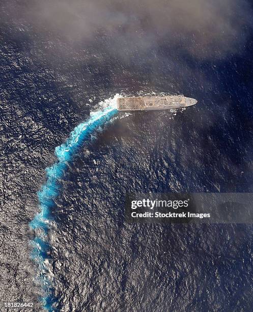 august 18, 2011 - the amphibious transport dock ship uss green bay (lpd 20) transits the indian ocean. - indian ocean stock pictures, royalty-free photos & images
