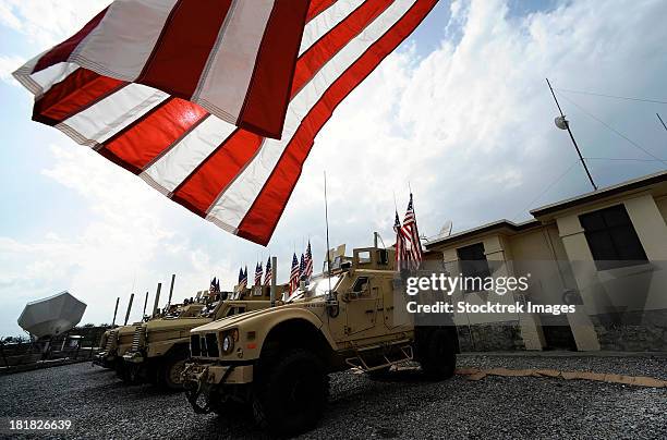 september 11, 2010 - members of the khowst provincial reconstruction team display american flags on tactical vehicles in remembrance of the events of 9/11.  - military vehicle stock pictures, royalty-free photos & images