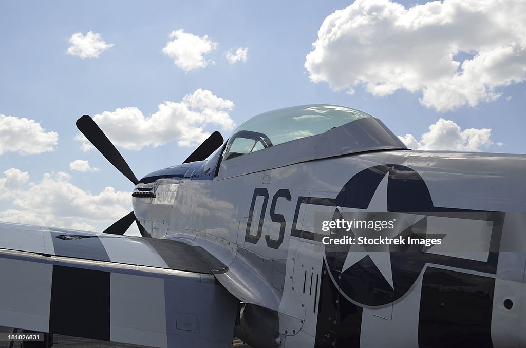 A P-51D Mustang parked on the flight line.