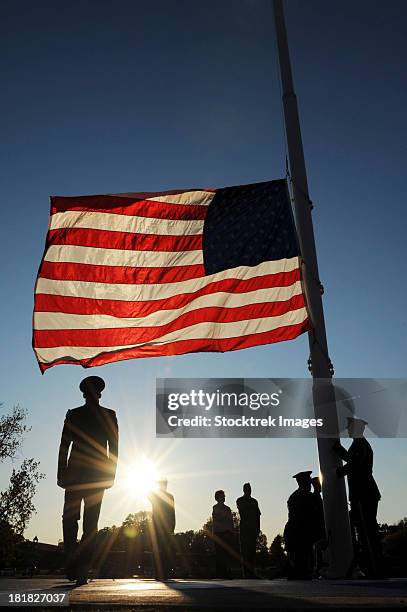 november 9, 2011 - veteran's day retreat ceremony at little rock air force base, arkansas.  - memorial day flag ceremony stock pictures, royalty-free photos & images