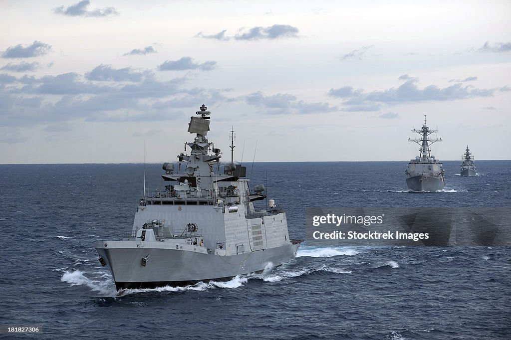 The Indian Navy frigate INS Satpura is underway with U.S. Navy ships.