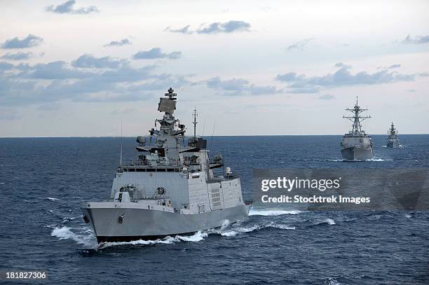 the indian navy frigate ins satpura is underway with u.s. navy ships. - indian navy stock pictures, royalty-free photos & images