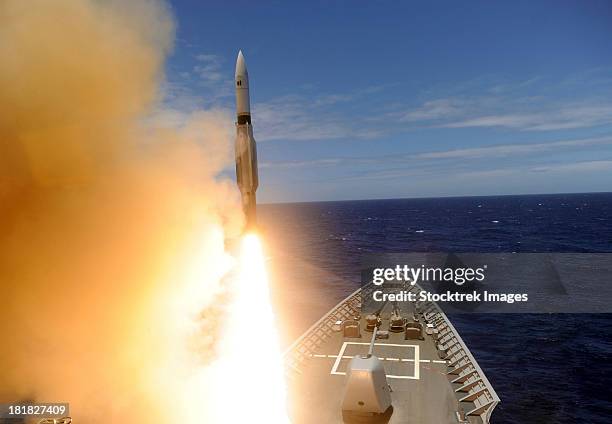 the guided-missile cruiser uss lake erie fires a standard missile. - uss lake erie cg 70 stock pictures, royalty-free photos & images