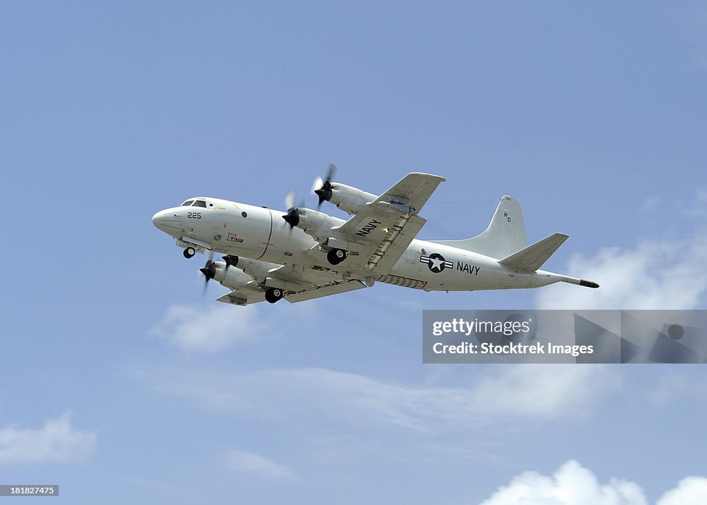 A P-3C Orion aircraft takes off from Marine Corps Base Hawaii.