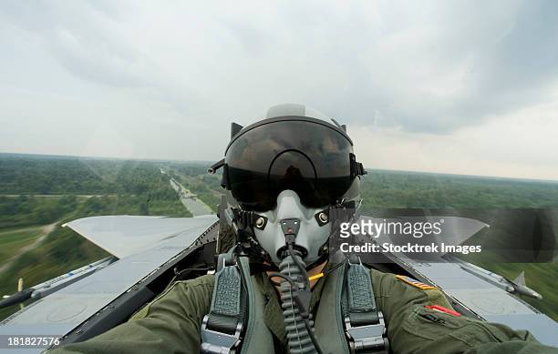august 27, 2008 - an aerial combat photographer takes a self-portrait during a sortie over new orleans, louisiana. - us air force stock pictures, royalty-free photos & images