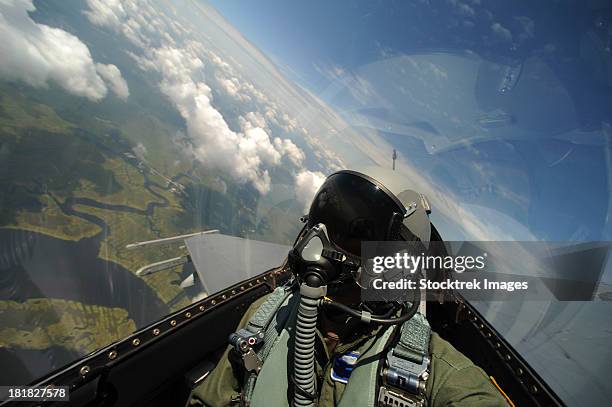 self-portrait of an aerial combat photographer during takeoff. - united states airforce stockfoto's en -beelden