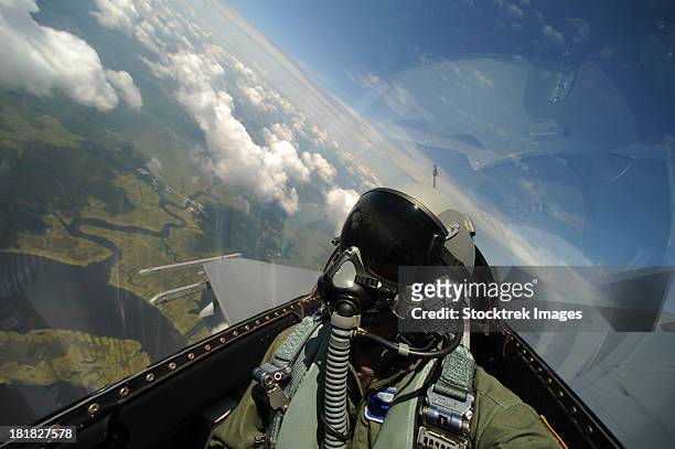 self-portrait of an aerial combat photographer during takeoff. - us air force stock pictures, royalty-free photos & images