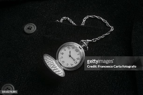 traditional pocket watch in the pocket - one empty desk stock pictures, royalty-free photos & images