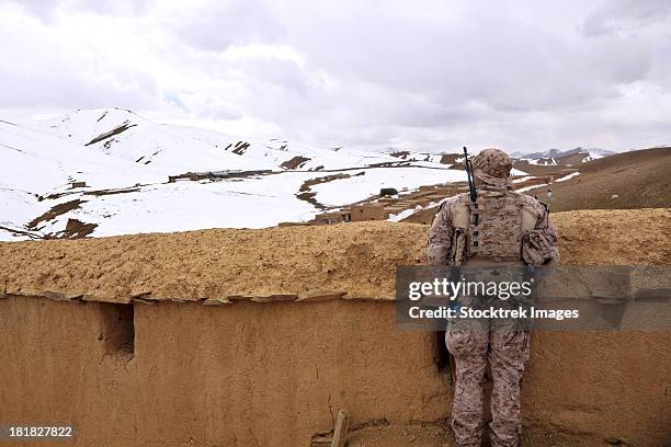 march 16, 2013 - coalition forces visit the hazaran village qarya-i-siya boghal, khas uruzgan district, uruzgan province, afghanistan. - war on terror stock pictures, royalty-free photos & images