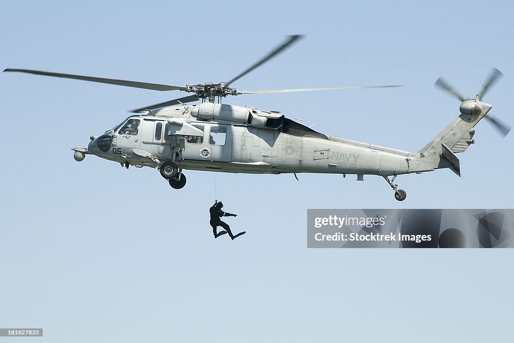 Yellow Sea, April 6, 2010 - A diver is lowered from an SH-60B Seahawk helicopter to commence a medical evacuation training exercise. 