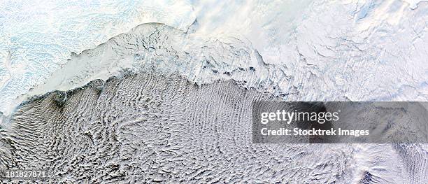 cloud streets over the bering sea. - bering sea stock pictures, royalty-free photos & images