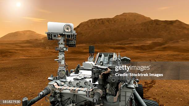 artist's concept of nasa's mars science laboratory curiosity rover, a mobile robot for investigating mars' past or present ability to sustain microbial life.  - mars curiosity stock illustrations