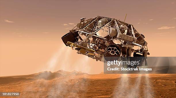 the rover and descent stage for nasa's mars science laboratory spacecraft. - landen stock-grafiken, -clipart, -cartoons und -symbole