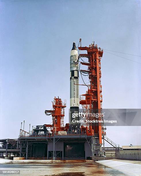 july 22, 1965 - overall view of launch pad 19 showing gemini-5 spacecraft atop the gemini launch vehicle 5 during a wet mock simulation exercise. - gemini space capsule stock pictures, royalty-free photos & images