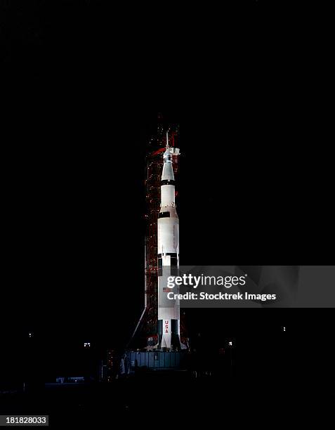 nighttime view of the apollo 10 space vehicle on its launch pad. - apollo space mission stock pictures, royalty-free photos & images