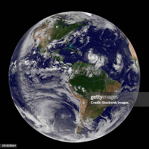 august 22, 2012 - full earth showing two tropical storms forming in the atlantic ocean, tropical storm isaac and tropical depression 10. - tempesta tropicale isaac foto e immagini stock