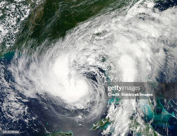 august 27, 2012 - tropical storm isaac moving northwest through the gulf of mexico. issac's large reach is seen by its eastern cloud cover over the entire state of florida. - tempesta tropicale isaac foto e immagini stock
