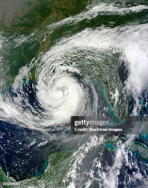 august 28, 2012 - tropical storm isaac moving northwest through the gulf of mexico. issac's large reach is seen by its eastern cloud cover over the gulf of mexico. - tempesta tropicale isaac foto e immagini stock