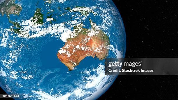 planet earth showing clouds over australia. - australia from space stock-fotos und bilder