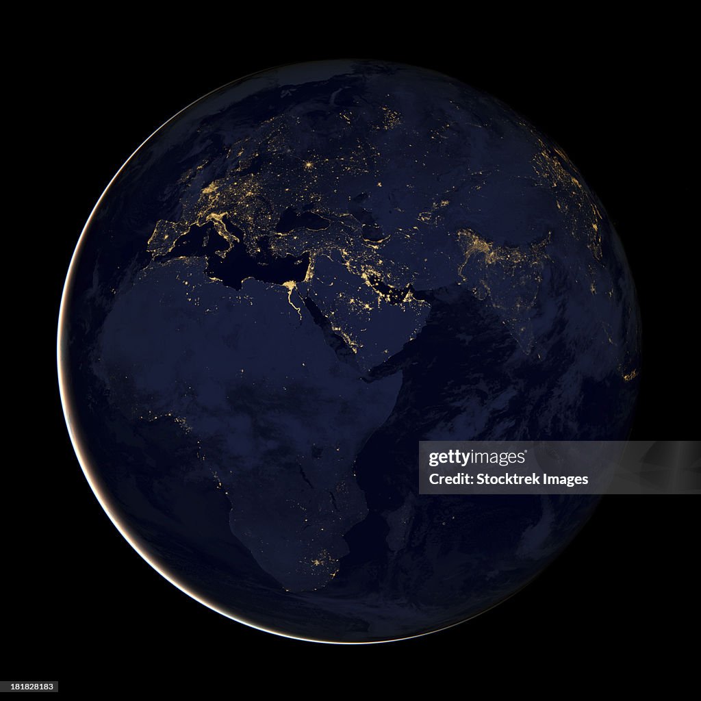 Full Earth showing city lights of Africa, Europe, and the Middle East.