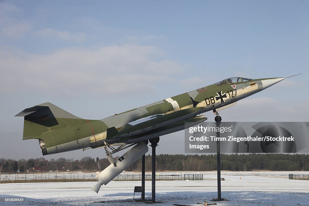 A preserved F-104G Starfighter with booster rockets pack to avoid damaged runway take-offs, Gatow Airfield, Germany.