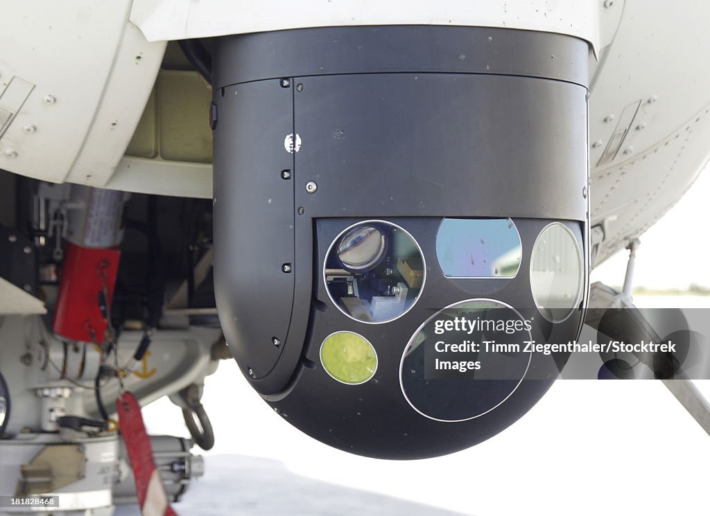 A Forward Looking Infrared (FLIR) camera, mounted on an EH101 utility helicopter.