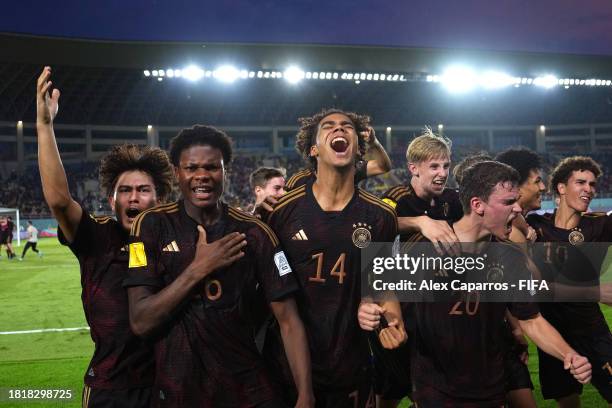 Players of Germany celebrate victory following a penalty shoot out during the FIFA U-17 World Cup Semi Final match between Argentina and Germany at...