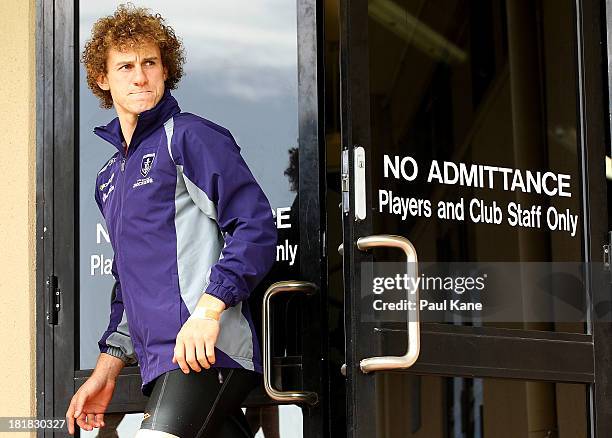Chris Mayne walks out from the players rooms during a Fremantle Dockers AFL training session at Fremantle Oval on September 26, 2013 in Fremantle,...