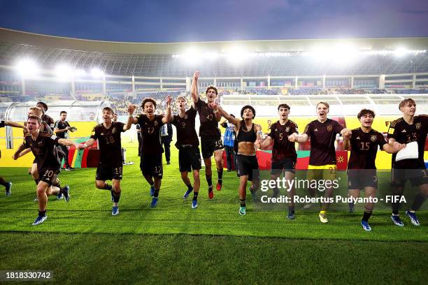 Players of Germany celebrate victory following a penalty shoot out during the FIFA U-17 World Cup Semi Final match between Argentina and Germany at...