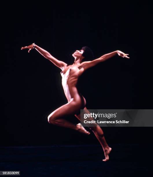 Studio portrait of American dancer and actress Paula Kelly as she poses naked, 1969.