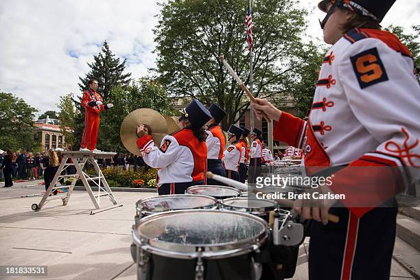 The Syracuse Orange marching band performs before a football game against Wagner Seahakws on September 14, 2013 at the Carrier Dome in Syracuse, New...