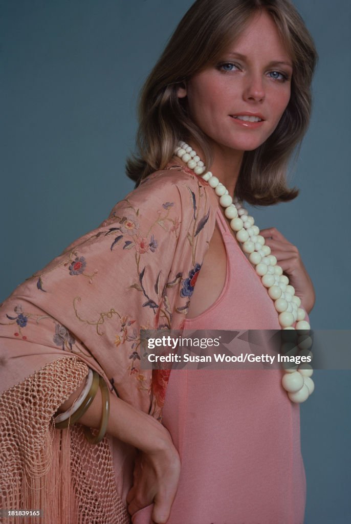 Portrait of American model and actress Cheryl Tiegs as she poses ...