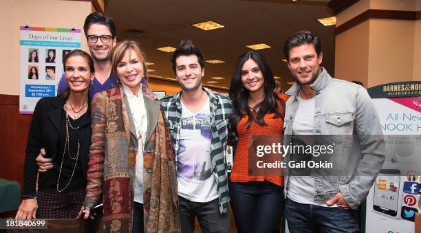 Kristian Alfonso, James Scott, Lauren Koslow, Freddie Smith and Camila Banus, cast members of Days of Our Lives pose for a picture before signing...