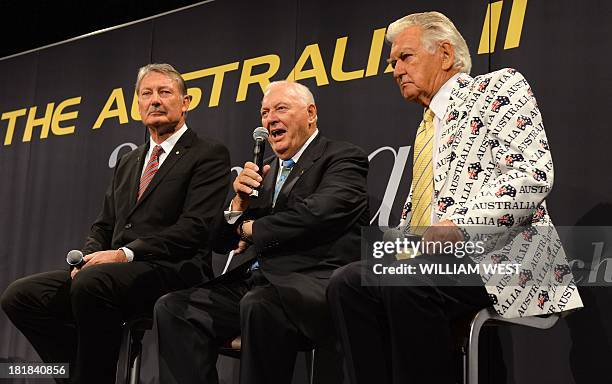 Australia II America's Cup boat owner Alan Bond along with former Australian prime minister Bob Hawke with Australia II skipper John Bertrand speak...