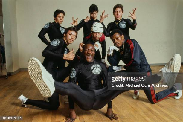 Group of young men from the 'New York City Breakers' demonstrate breakdancing on a dance studio, New York, circa 1985.