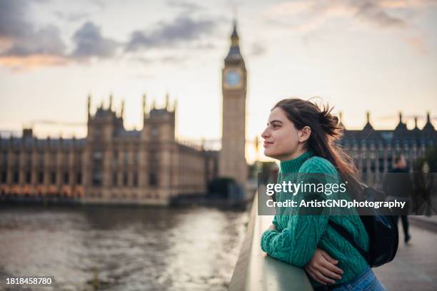 woman admiring the beauty of city of london. - city of westminster london stock pictures, royalty-free photos & images