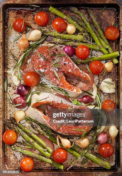 raw salmon steaks in a roasting pan - chopping stock pictures, royalty-free photos & images