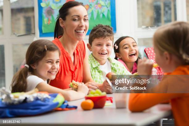 young students at lunchtime - lunch and learn stock pictures, royalty-free photos & images