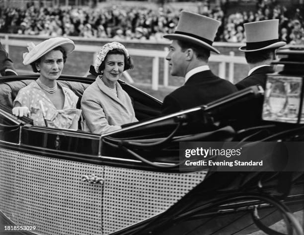 Princess Alice, Duchess of Gloucester and Princess Marina, Duchess of Kent riding in an open carriage to attend a Royal Ascot race meeting,...